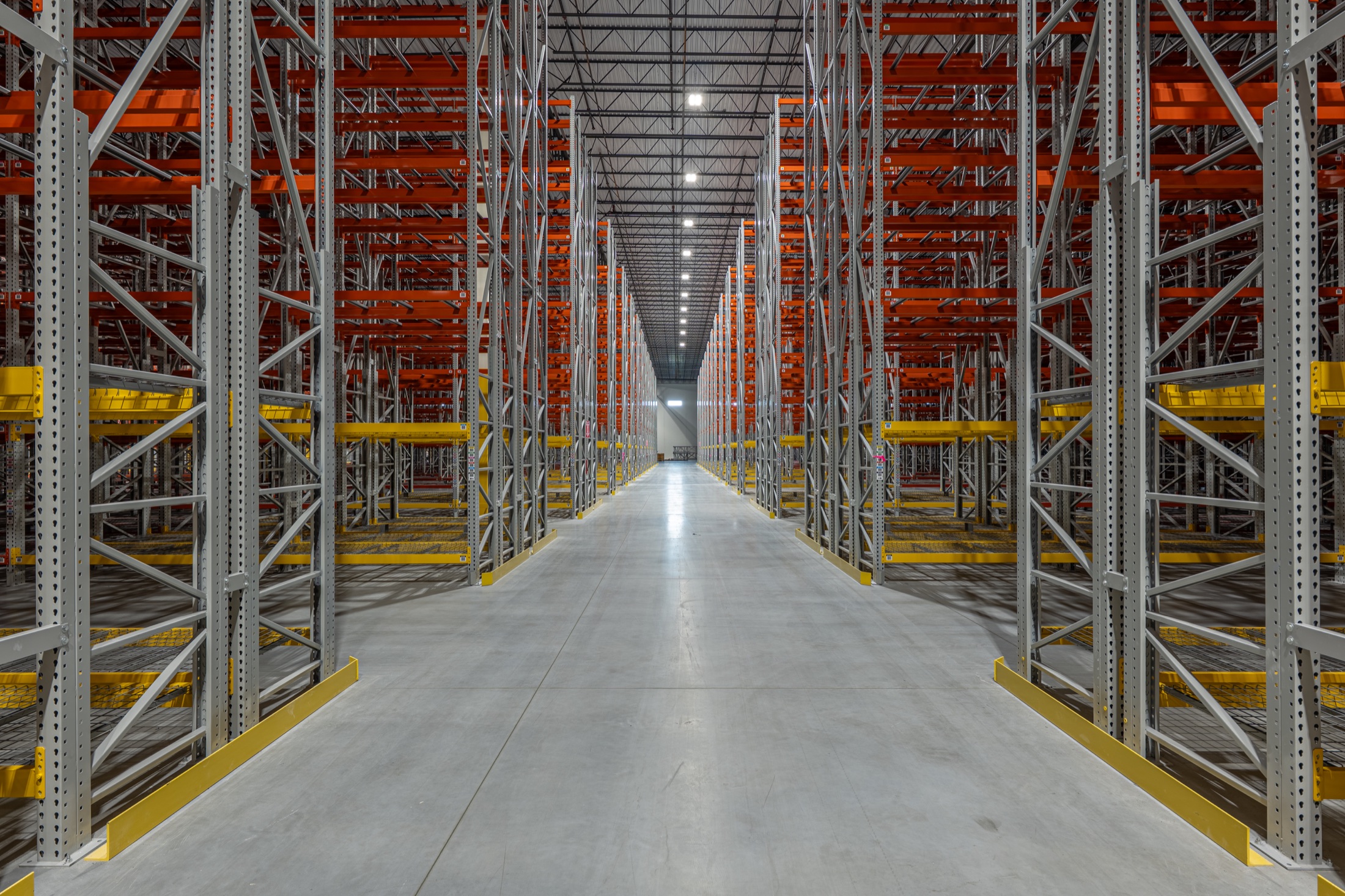 Long aisle through DHL warehouse racking