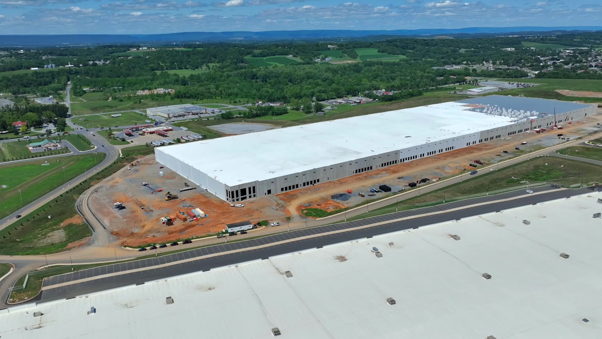 Aerial view of Building 1 under construction at Clear Springs Logistics Park